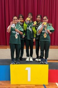 Pakistan basketball team celebrating Gold Medal victory on the podium at BISC.