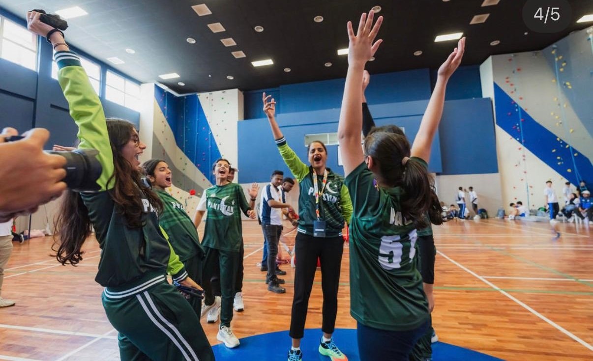Pakistan basketball team celebrating their winning moment on the court during the international BISC competition in Malaysia.